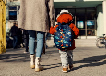 Mom walking young child