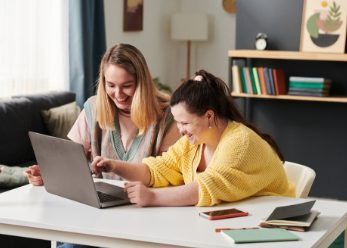 Mentor working with student with intellectual disability