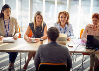 Search committee interviewing a candidate